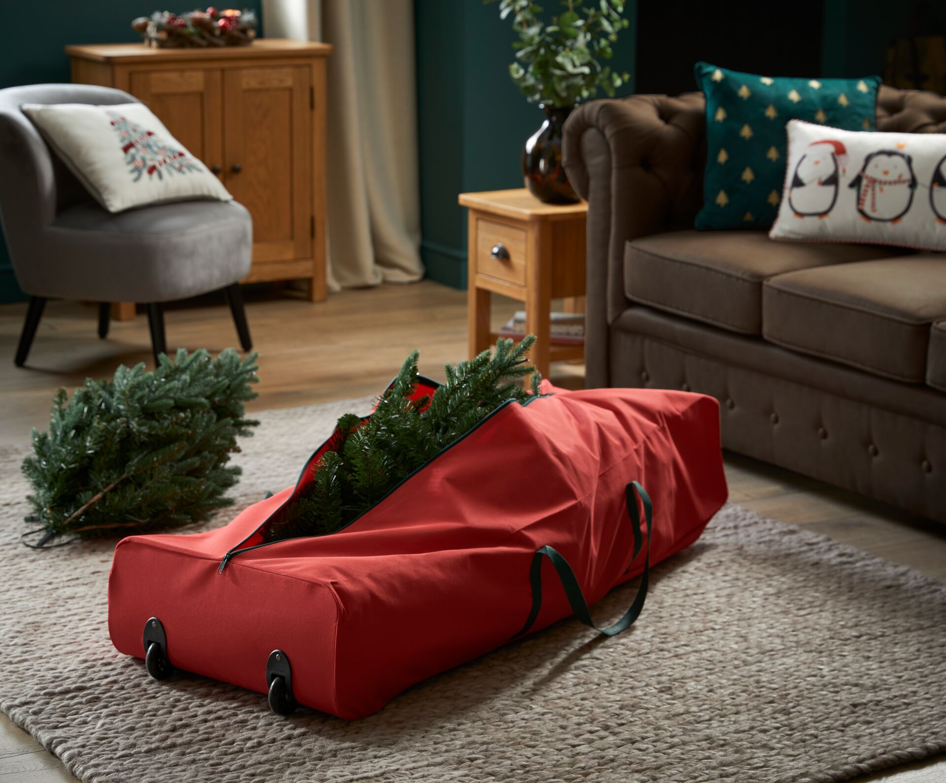 Image of an artificial Christmas Tree in a red storage bag
