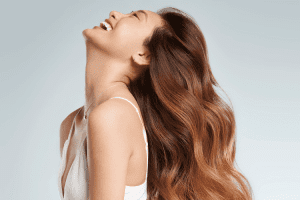 woman with brown hair laughing