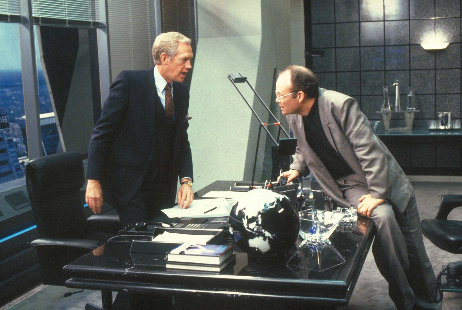 Clarence and Dick converse in Robocop