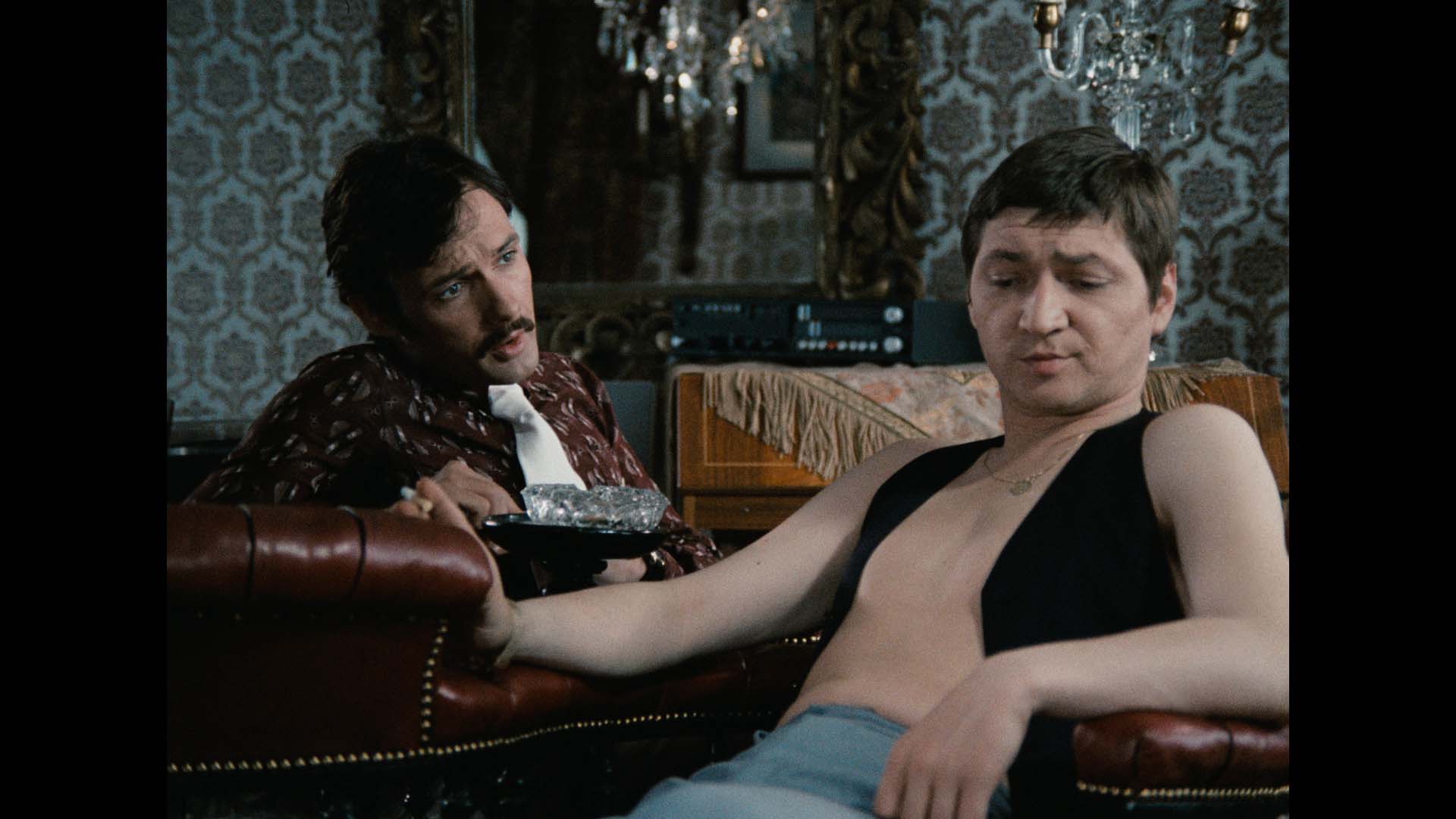 Peter Chatel as Eugen with Fassbinder himself in the lead role of Fox in Fox and his Friends (1975)