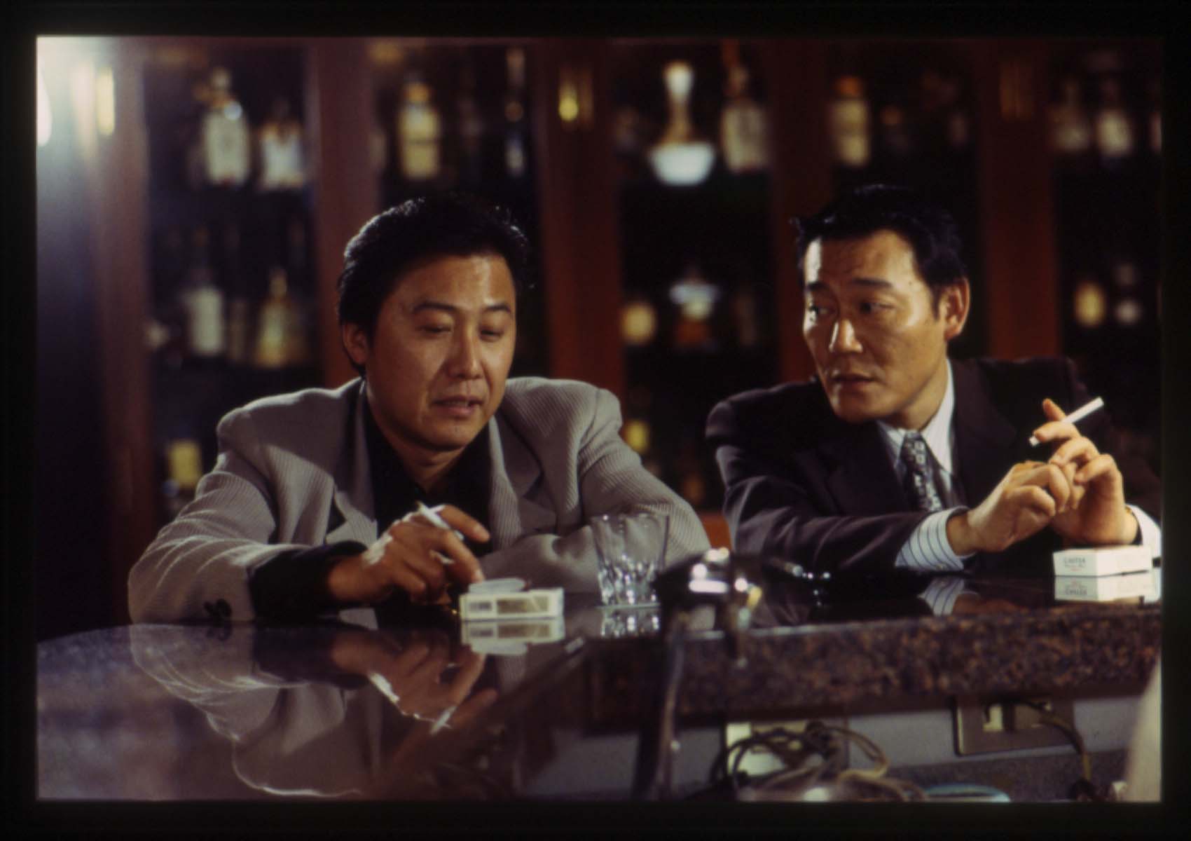 Shigeharu (Ryo Ishibashi) reflects on his love life with film producer friend Yoshikara (Jun Kunimura)