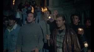 An angry mob forms in Demonia (1990)