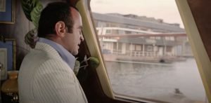 Harold looks from his boat out to the Thames in The Long Good Friday (1980)