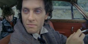 Withnail (Richard E. Grant) is stopped by the police.