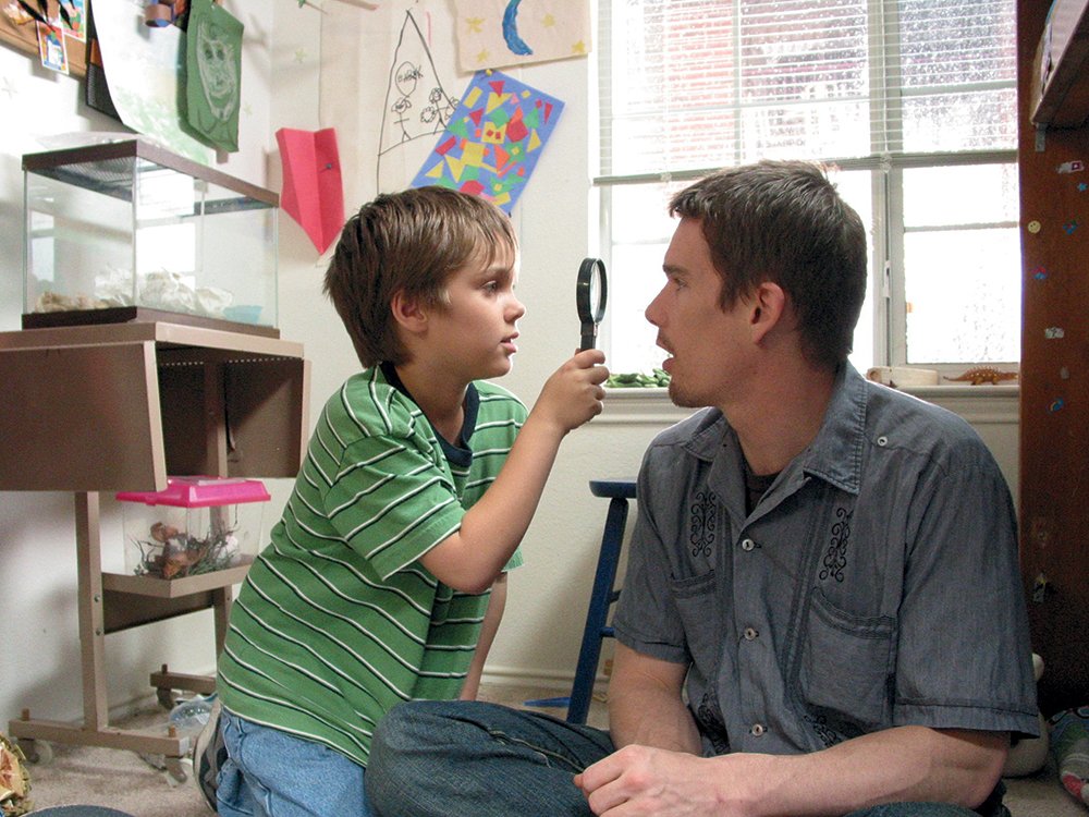 Mason (Ellar Coltrane) sizes up his dad (Ethan Hawke) in Boyhood (2014)