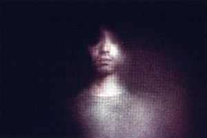 A haunting figure in Pulse (2001)