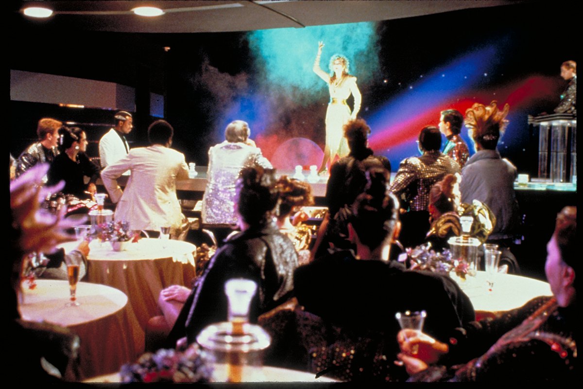 A nightclub scene from Arena (1989)