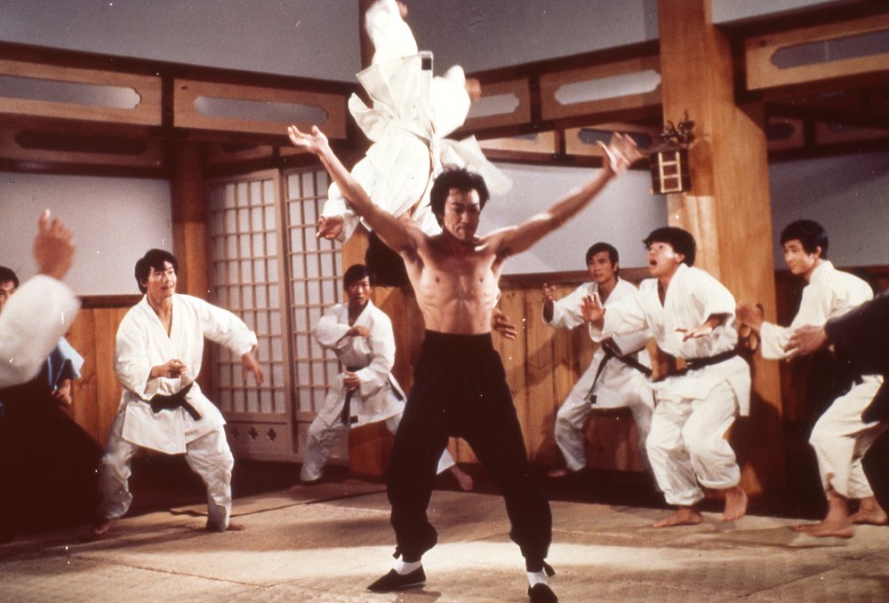 Bruce Lee prepares to fight in a dojo in Fist of Fury (1972)