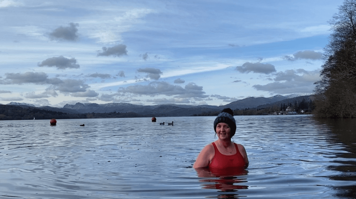 A woman enjoying outdoor swimming