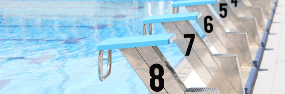 A row of diving boards at a swimming pool