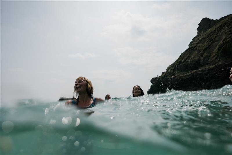 Close up of woman swimming in Speedo gear