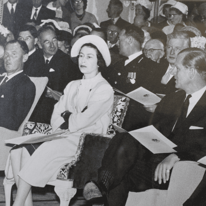 Queen Elizabeth II and Prince Phillip attend a fashion show in Hawick, 1962