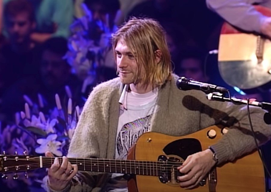 Kurt Cobain wears a mohair cardigan at Nirvana's MTV Unplugged concert in 1993