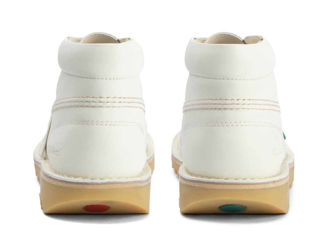 Image of the back of a pair of white Kickers shoes against a white background
