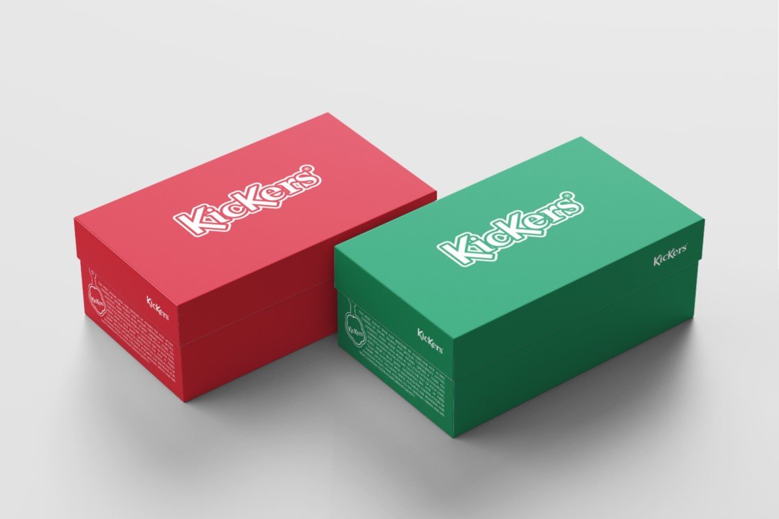 An image of a one red and one green Kickers shoebox