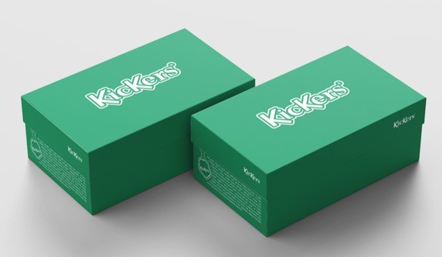 Two green Kickers shoeboxes