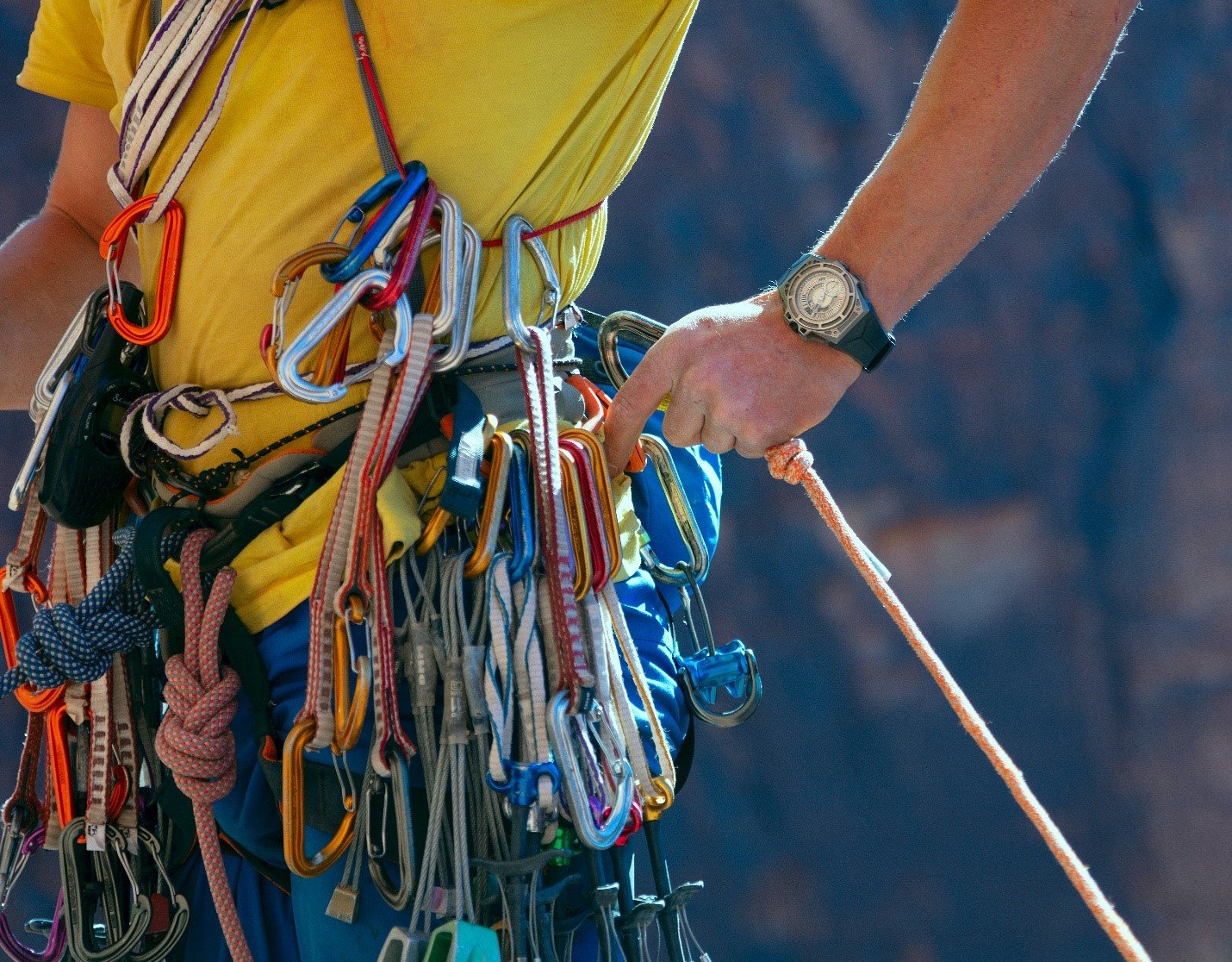 Countless ropes attached to climbers harness