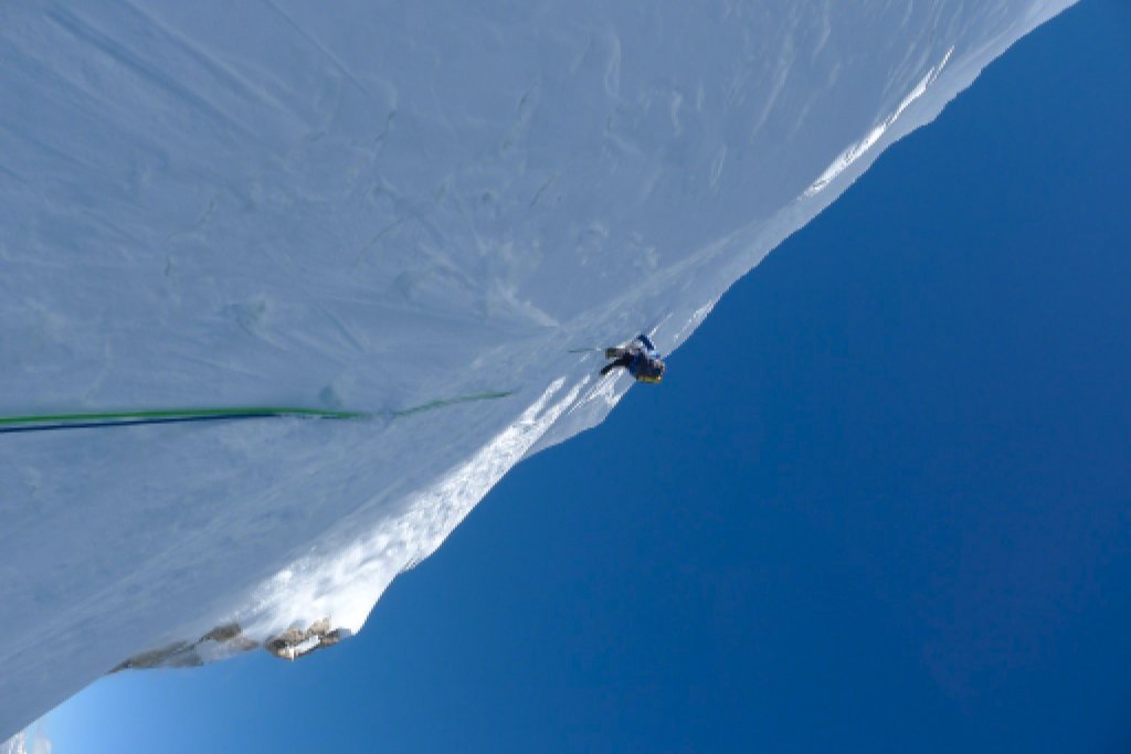 Mick Fowler climbing ice wall