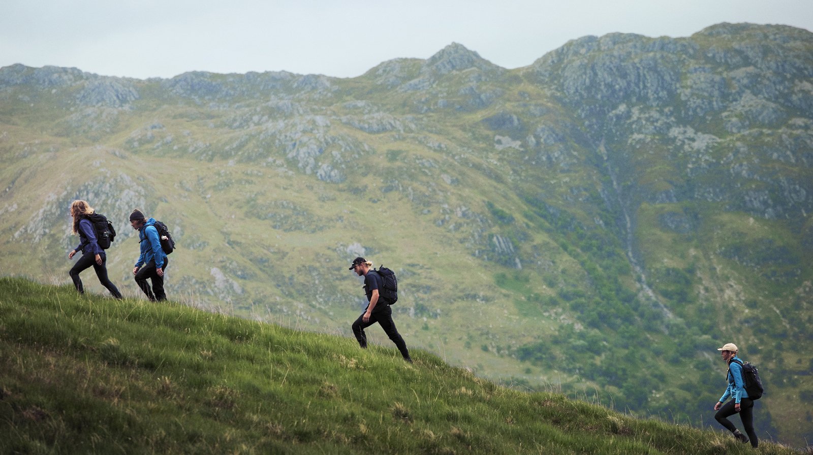 Berghaus athletes ascend a steep hill