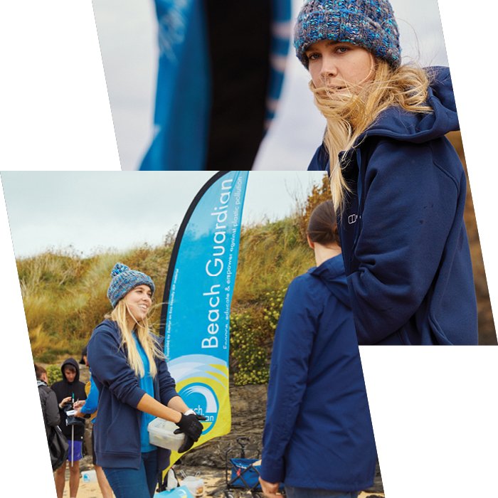 Emily standing and smiling in all blue Bergahus gear