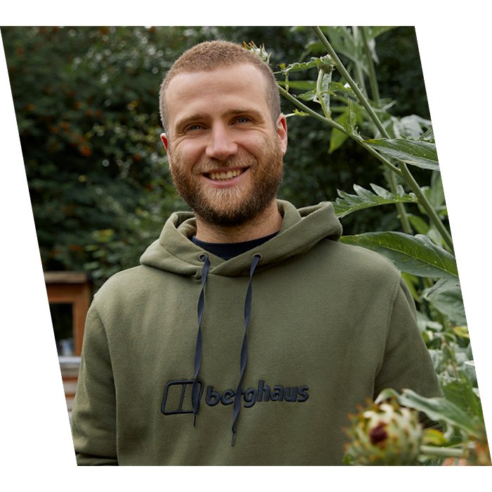 Smiling man in brown Berghaus jumper