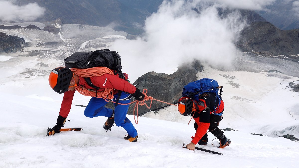 Ed climbs mountainside in Berghaus gear