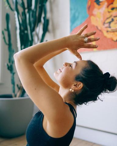 women meditating and practicing yoga