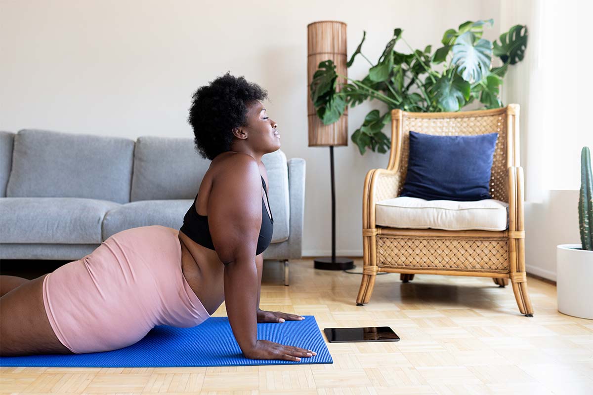 woman-in-cobra-pose-yoga-mat
