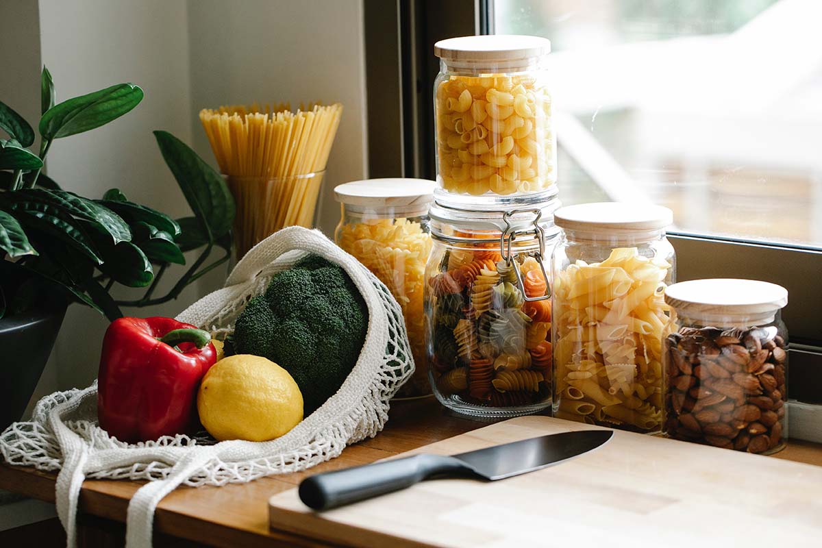 fresh vegetables and pastas in jars