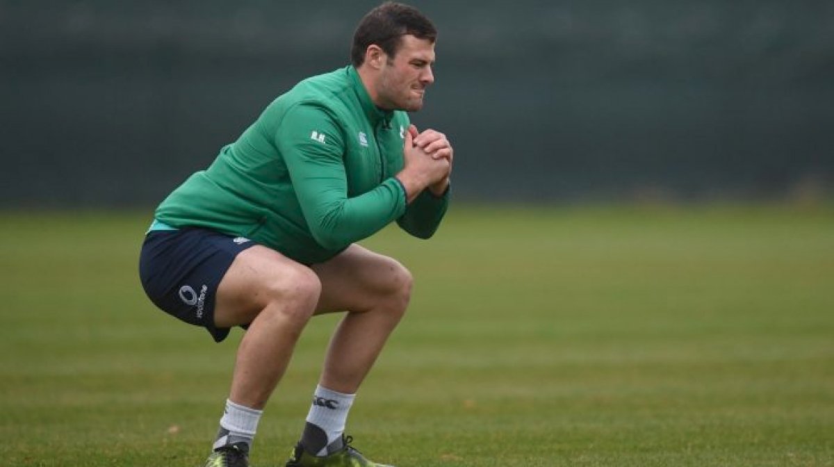 Ireland player performs squat