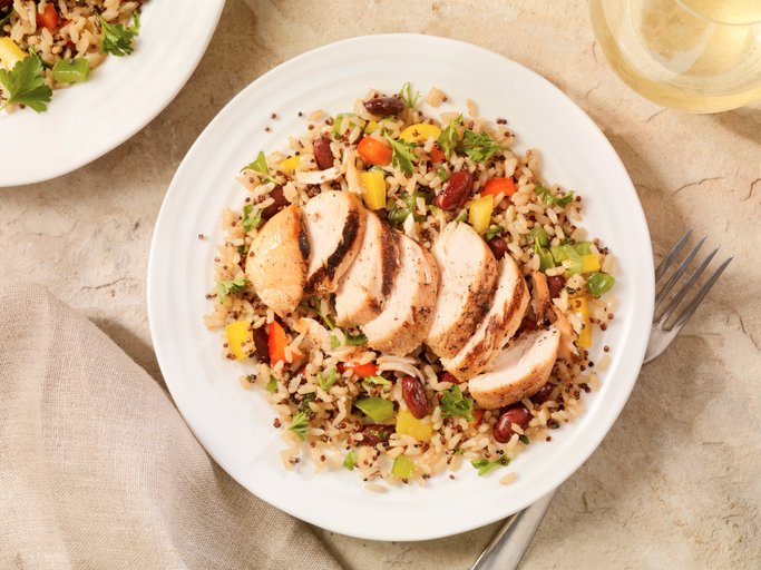 Chicken served in a bowl of rice