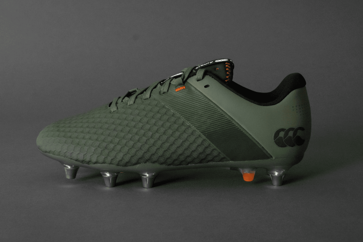 Green Canterbury boots on grey background