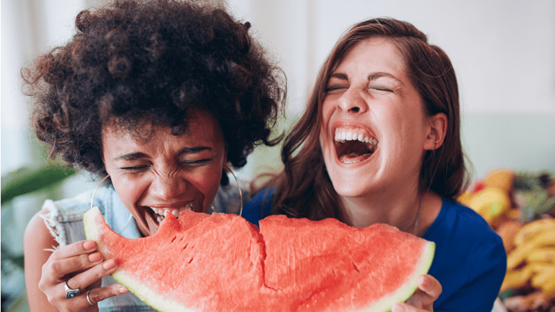 picture of two girls with watermelon