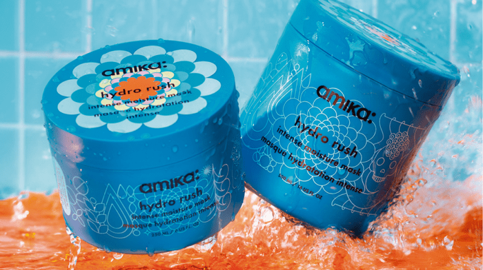 amika hydro rush moisture mask on a blue background