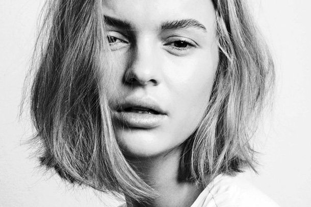 black and white image of a model with dishevelled bob