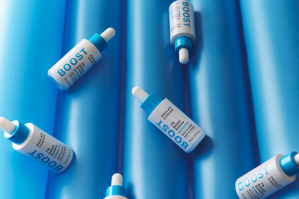 Paula's Choice new Ectoin booster against a blue background 