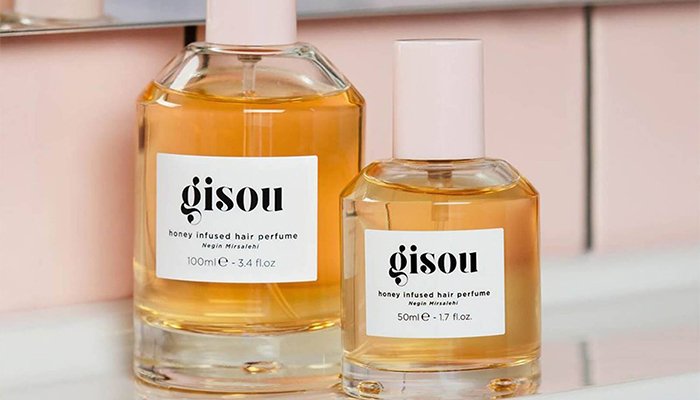 two bottles of gisou hair perfume