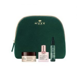 a green velvet makeup bag and three NUXE products