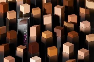 close up of huda beauty faux filter foundation sticks all open showing the array of different shades.