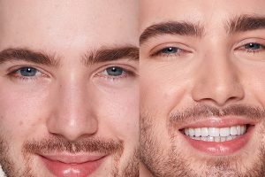 charlotte tilbury's flawless filter foundation on a male model smiling wearing neutral 2