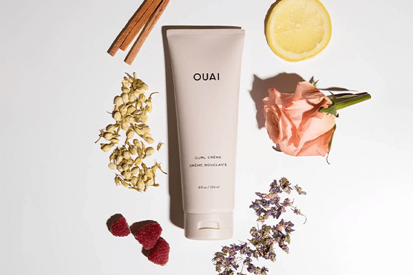 OUAI CURL CREAM SURROUNDED BY DIFFERENT SPICES 