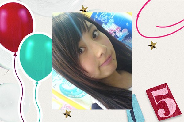 asian young girl smirking with dark bown hair and a fringe against birthday campaign imagery
