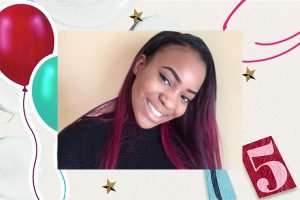 dark skinned model image smiling with red hair against birthday campaign imagery