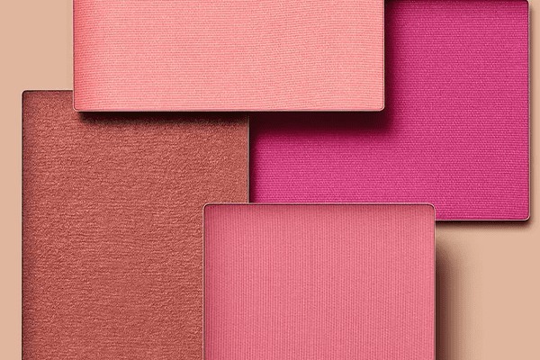 An extreme close up shot of different nars’ blushes featuring pink, red, brown shades each sat in a square pan
