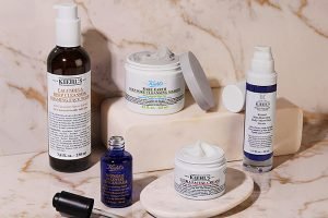 a collection of kiehls products shot in a studio 