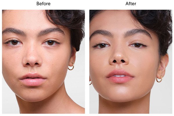 A close up of a before and after image of a female model wearing Hourglass’ Vanish Airbrush Concealer in shade Sienna. 