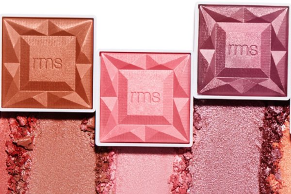 three different shades of RMS beauty powder blushes in terracotta, pink and mauve swatched below each blusher.