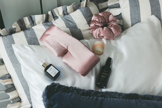 A selection of sleep products placed on a pillow