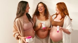 pregnant women with Mama Mio products
