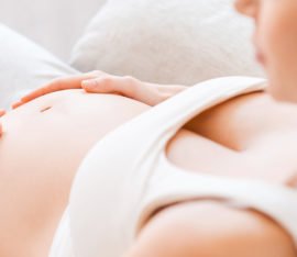 Why does pregnancy cause a heightened sense of smell and nausea?